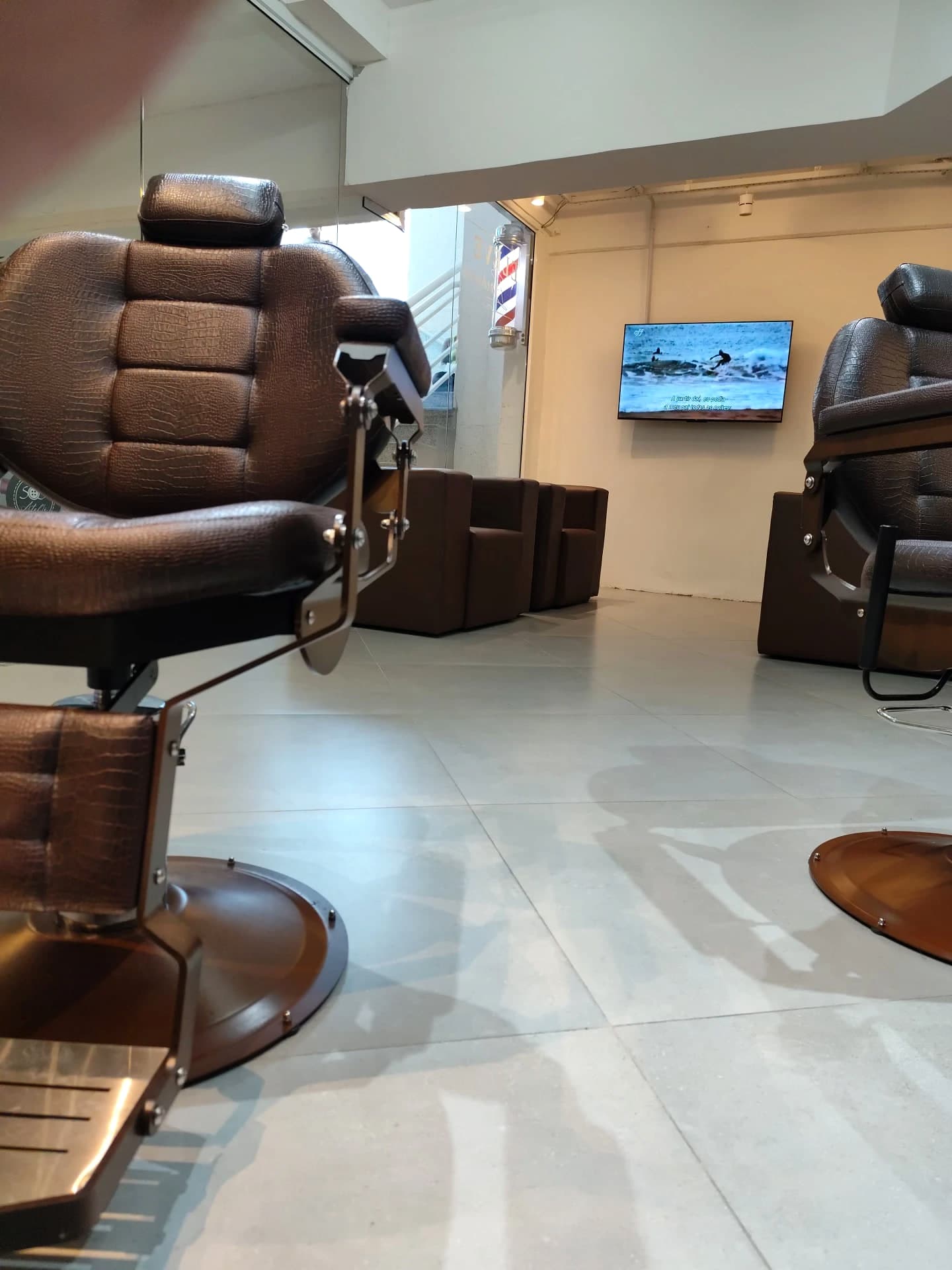 Área de espera da Eleve Barbearia